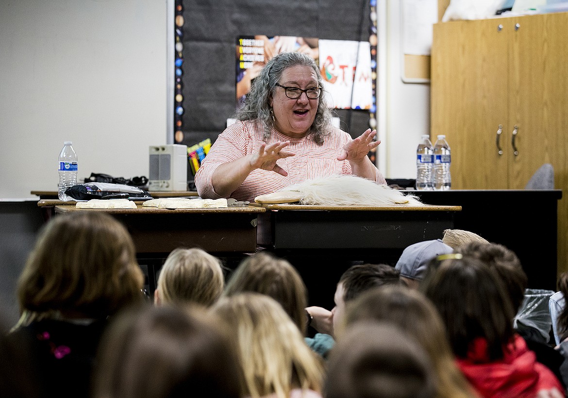 LOREN BENOIT/Press
Nonfiction author Kelly Milner Halls speaks to a group of second-grade students at Fernan STEM Academy Friday afternoon. The quirky author spoke about dinosaurs, weird animals and Bigfoot to help kids learn how to be critical thinkers and question claims posted online.