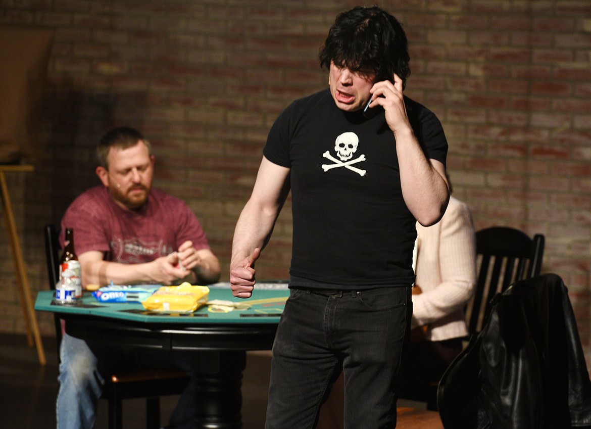 ERIC MYERS, playing Jumbo Dombroski, has a menacing phone conversation during a rehearsal for &#147;Panache&#148; on Tuesday. (Aaric Bryan photos/This Week in the Flathead)