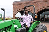 Evergreen donates tractor to Ghana