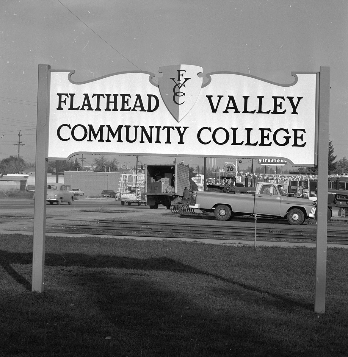 The original sign in 1967 for Flathead Valley Community College outside the old depot building where the school was headquartered. The view is looking north across the railroad tracks. (Inter Lake file photos)