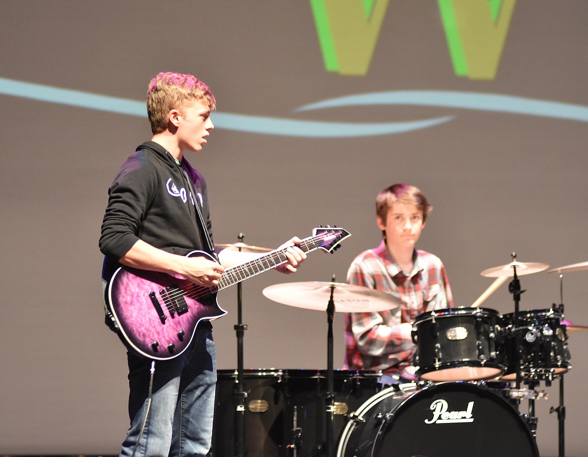 Whitefish High School student council held its annual Talent Show Thursday showcasing the talents of several students who sang, danced and performed comedy acts. Casey Schneider and Caden Means perform along with Jessica Henson and Eden Scrafford. The group perfomed &#147;Heart Shaped Box&#148; by Nirvana. (Heidi Desch/Whitefish Pilot)