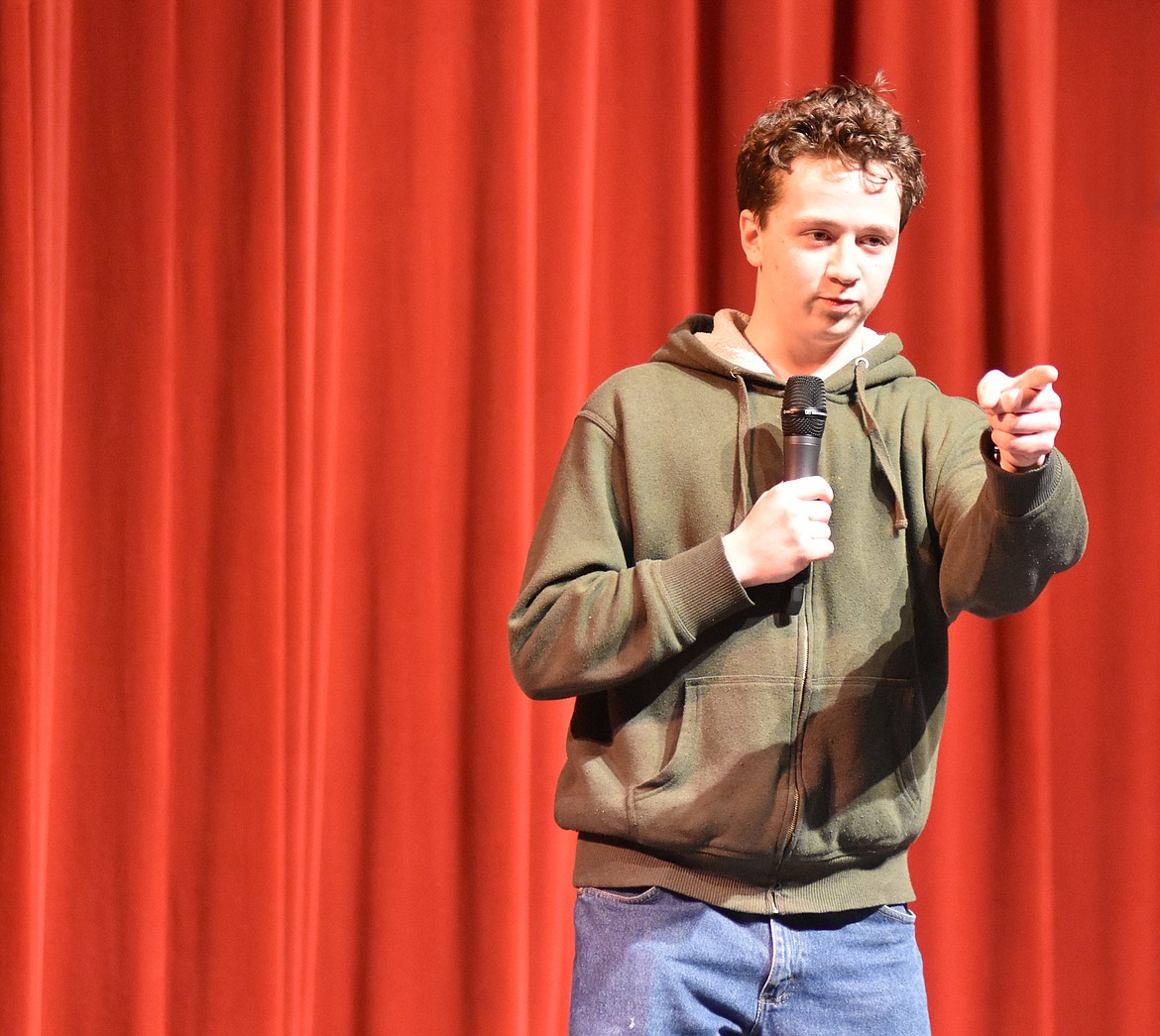 Whitefish High School student council held its annual Talent Show Thursday showcasing the talents of several students who sang, danced and performed comedy acts. Casey Valez points to the audience during his stand-up comedy routine. (Heidi Desch/Whitefish Pilot)