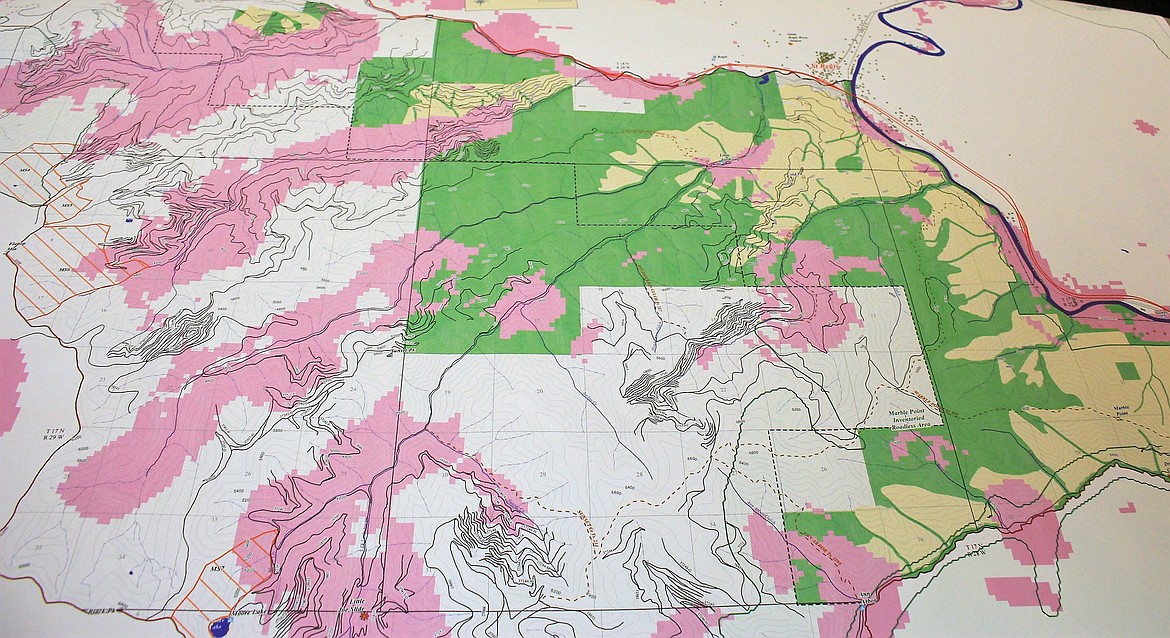 A map of the Redd Bull project shows pink areas where fires had burned. The public was invited to learn about the Forest Service project and give input at a recent St. Regis meeting. (Kathleen Woodford/Mineral Independent).