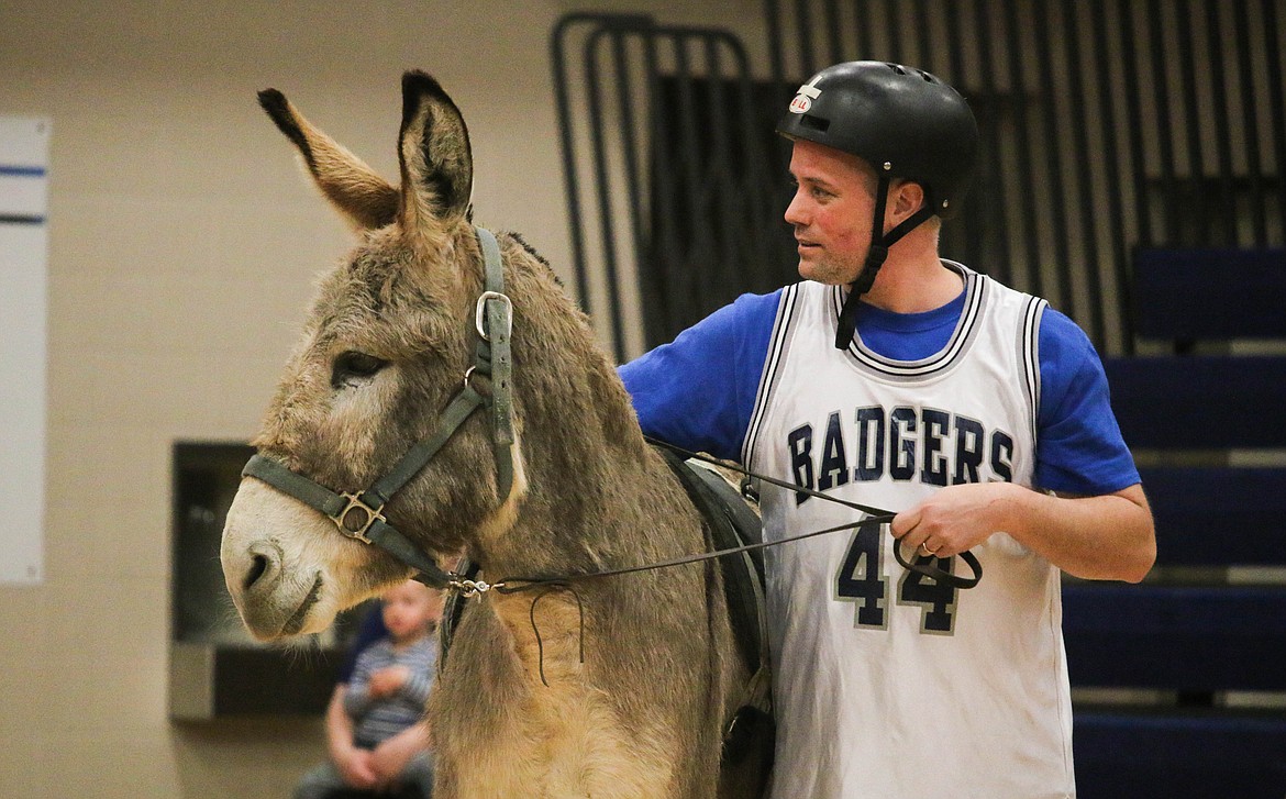 &#151;Photo by MANDI BATEMAN
Jacob Garrison and his basketball partner, taking a break together.