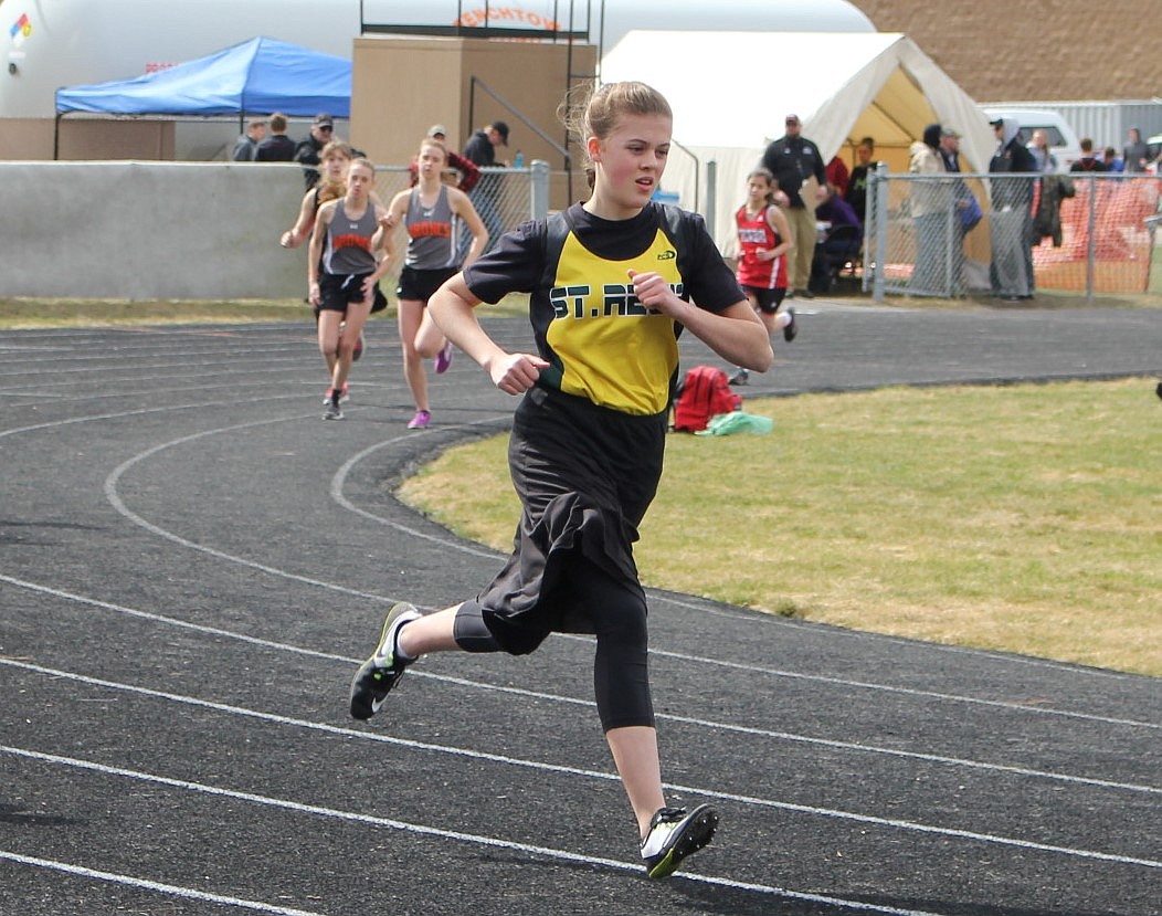 St. Regis favorite for State, Madison Kelly, placed third in both the 800 meter and 1600 run during the meet in Frenchtown. (Kathleen Woodford/Mineral Independent).