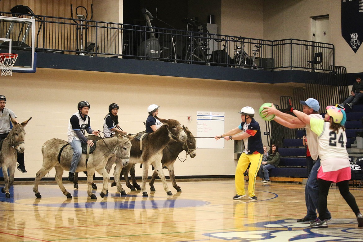 &#151;Photo by MANDI BATEMAN
The Donkey Basketball competion was fierce as the Centers battle for possession of the ball.