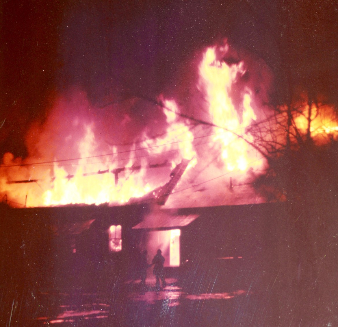This color photo of the VFW fire from 1977 has been hanging in an office of the Plains VFW post 3596. The only note below the framed photo is Cockrell Photo.