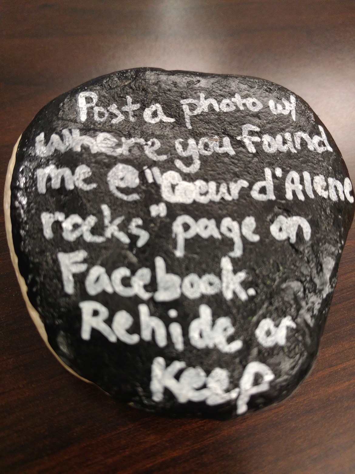 DEVIN HEILMAN/Press
This message is on the backs of the Coeur d'Alene Rocks painted stones to encourage people to share photos of their finds.