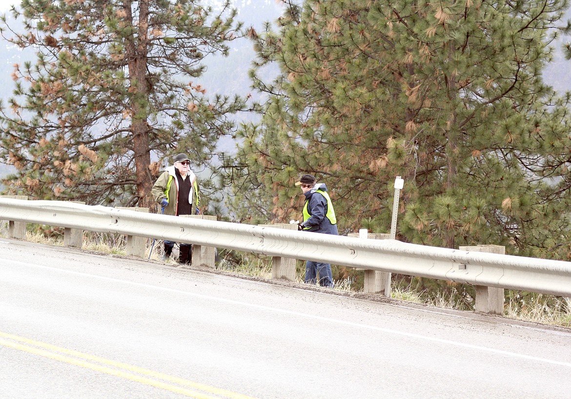 BOB AND Kathy Gregg stand beside Montana 200, picking up trash beside the longest state highway in Montana. (Douglas Wilks/Clark Fork Valley Press)