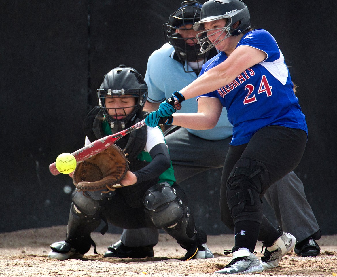 Columbia Falls outfielder Taylar Putnam connects with a pitch during against against Belgrade in Polson Saturday. (Jeremy Weber)