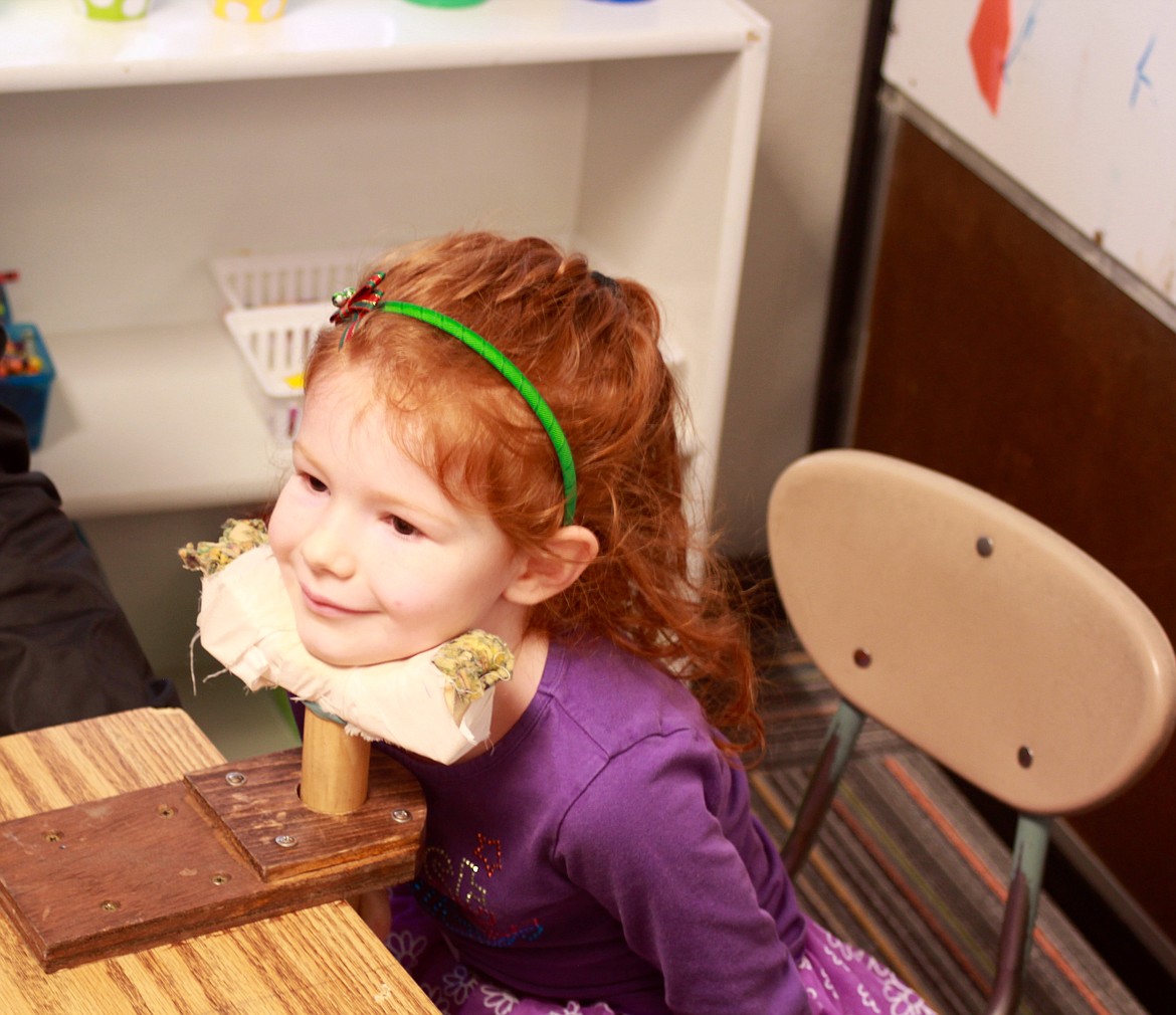 SYDNEY UNDERHILL has her eyes checked by the Plains Lions Club during the recent Kindergarten Roundup. (Douglas Wilks/Clark Fork Valley Press)