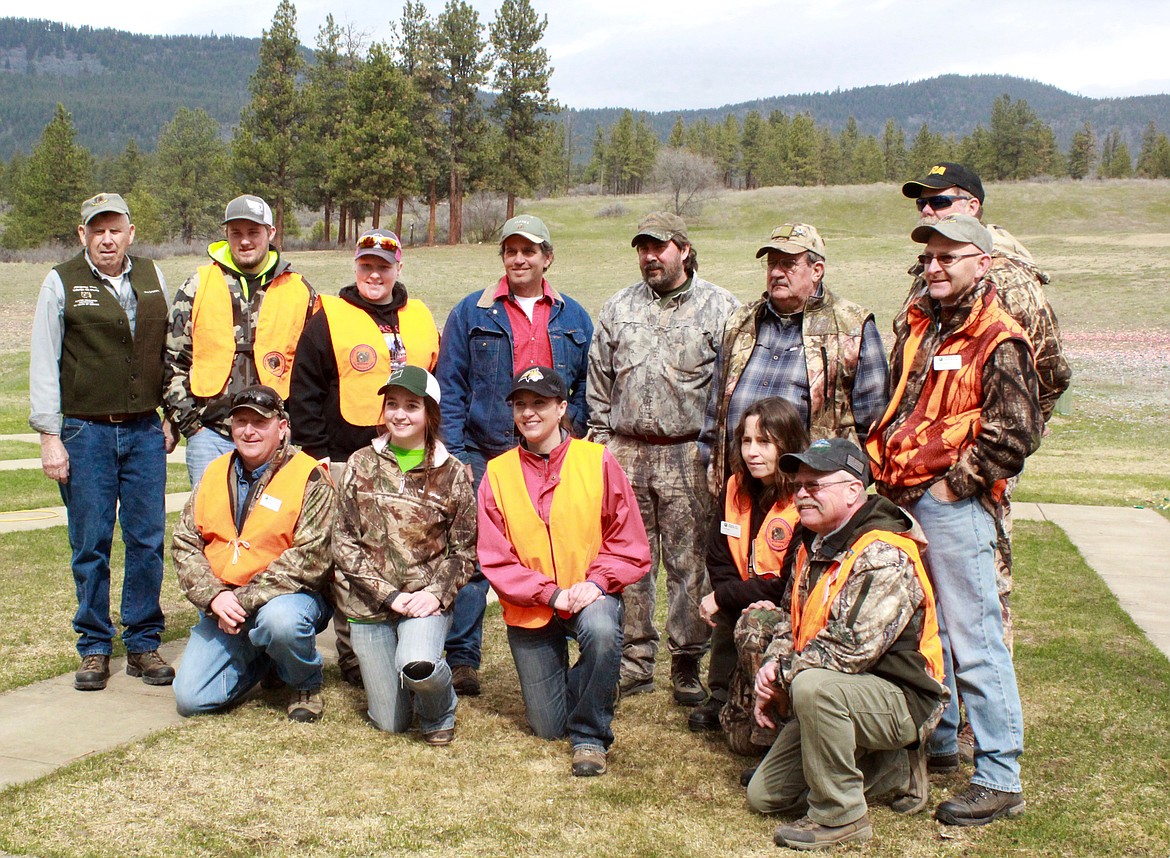 HUNTER EDUCATION instructors from Sanders County,  back row from left: Phil Crismore, Logan Benson, Keely Benson, Gerald Powell, Wayne Crismore, Harold Hudson, Pat Connolly and Kim Earhart. Front row from left: Kenny Benson, Meagan Morgan, Collette Morgan, Lisa Brown and Dan Lilja. (Douglas Wilks/Clark Fork Valley Press)