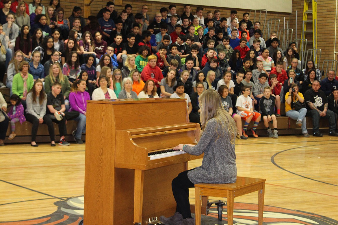 Cheryl Schweizer/Columbia Basin Herald
Emma Buchmann shows her skills at the piano to all of Ephrata Middle School at the annual talent show Friday.