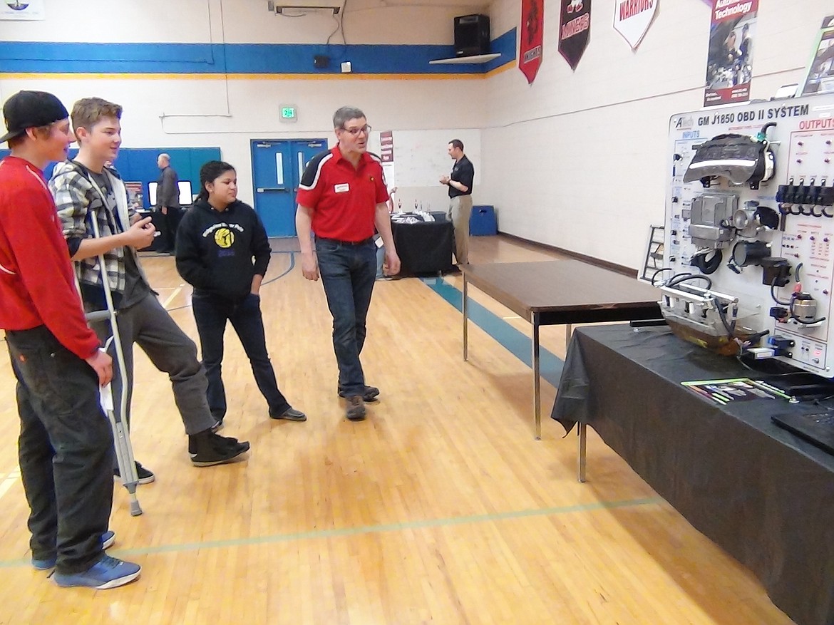 (Courtesy photo)
Clark Fork Junior/Senior High Students check out the automotive diagnostics training simulator during the North Idaho College CTE Roadshow, which traveled to the high school Friday.