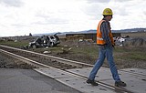 Investigators: Driver tried to beat train to crossing