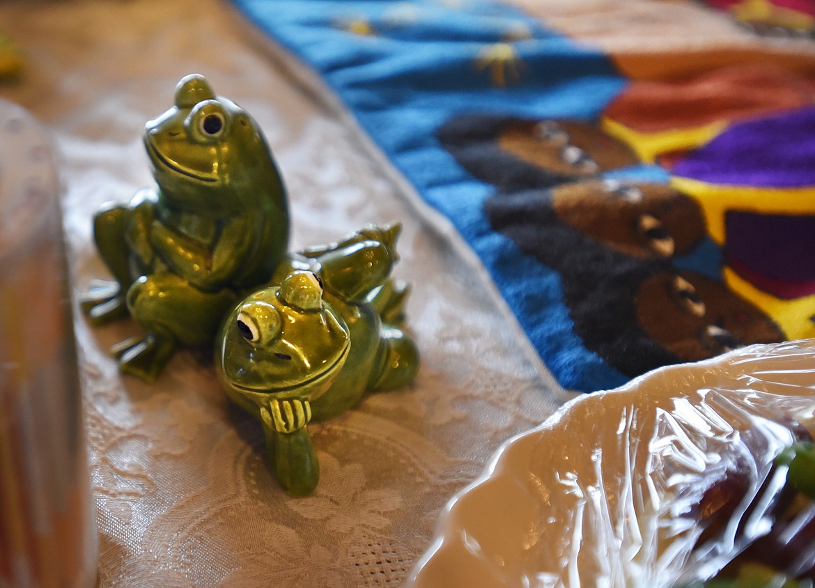 A pair of ceramic frogs add a splash of color and symbolism to the decorations for Passover at the Roston&#146;s. The frogs represent one of the plagues of Egypt which lead to the liberation of the Israelites as told in the book of Exodus. Roston has been collecting frogs for 15 years.