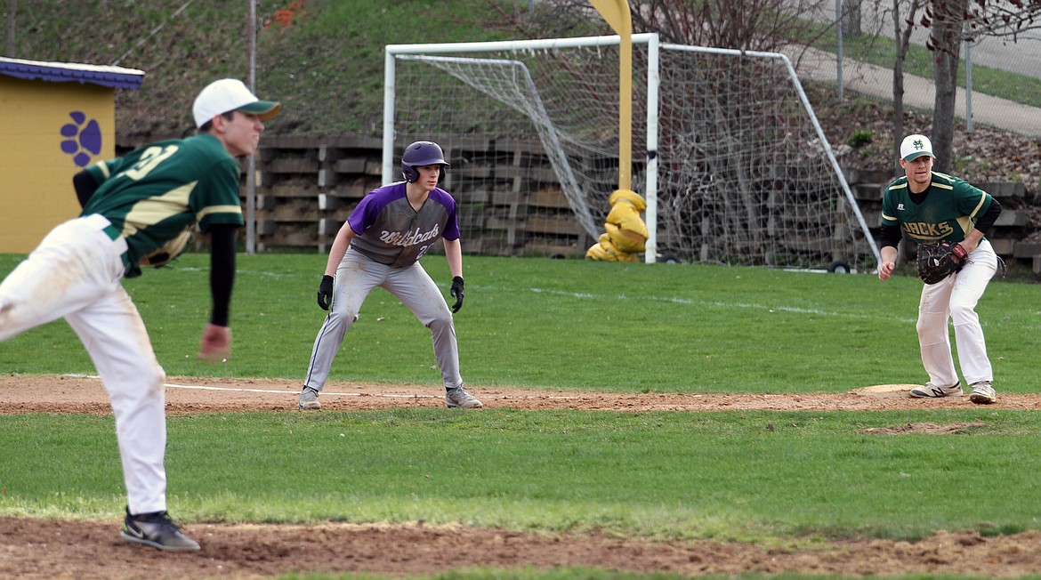 Photo by JOSH McDONALD
Gavin Luna gets a big lead off first base during Kellogg's game against St. Maries.
