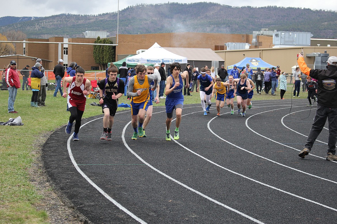 It was a cold, rainy track meet on Saturday with 17 teams participating in the Frenchtown Invite. Clark Fork&#146;s Kaden Hensleigh (far left) starts the 1600 run. (Kathleen Woodford/Mineral Independent).