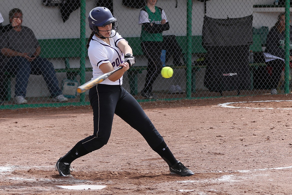 POLSON LADY Pirates softball player Haley Fyant connects with a pitch this weekend in the Belgrade Tournament. (Photo courtesy of Bob Gunderson)