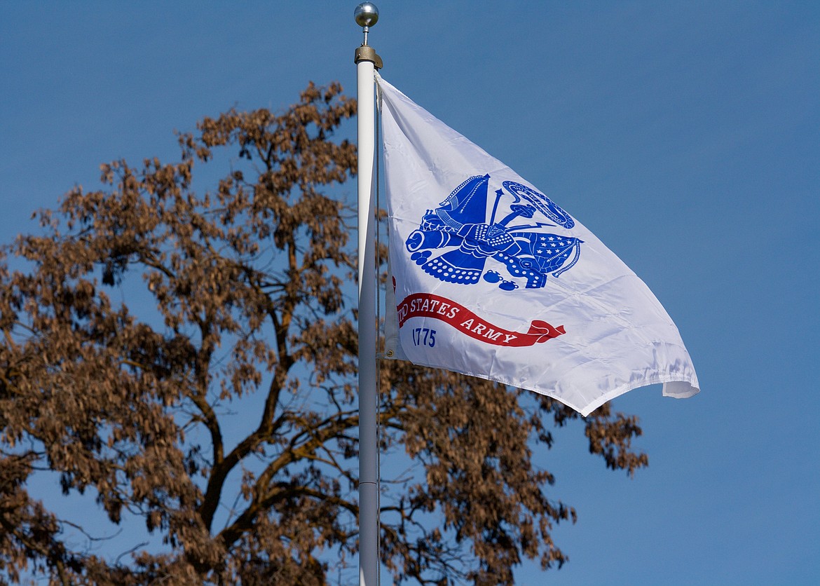 The United States Army flag flaps in the light wind at the Plains cemetery.