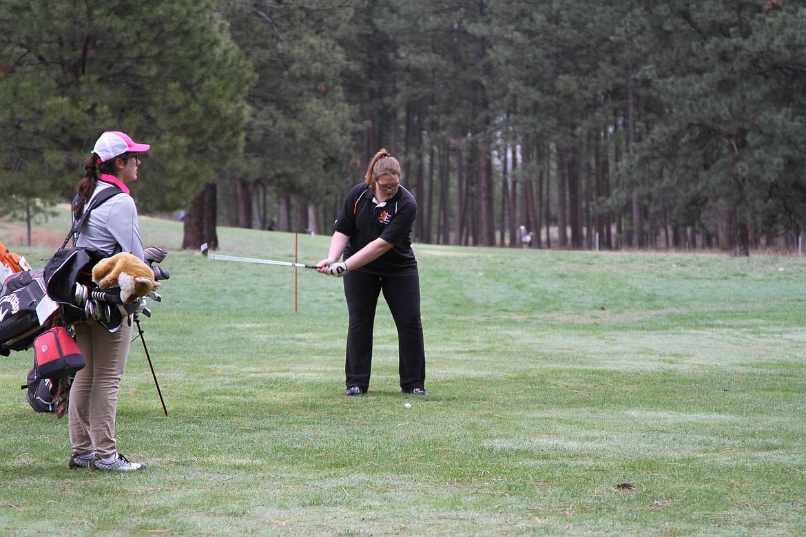 SHAYNA BURGESS at the Plains Golf course during the annual Plains Invitational golf meet.