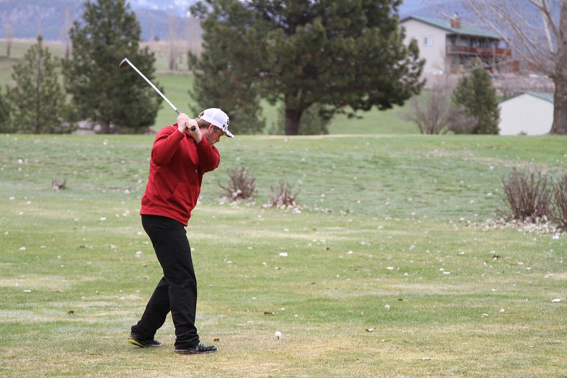 LOGAN BENSON at the Plains Golf course during the Plains Invitational golf meet.