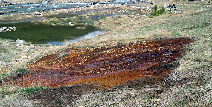 Courtesy photo
Exposed contaminated dirt near Canyon Creek.