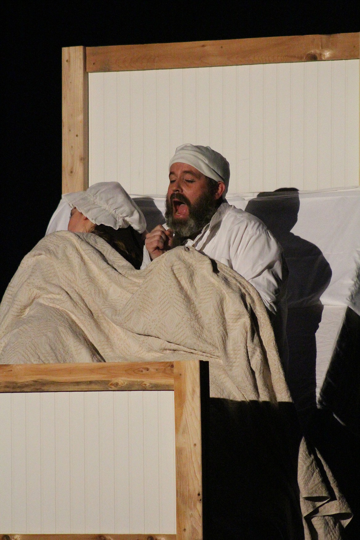 Richard Byrd/Columbia Basin Herald
Teyve (Tim Cloyd) wakes up his wife Golde (Rebecca Dalton) with a loud scream Friday night during &#145;Fiddler on the Roof.&#146;