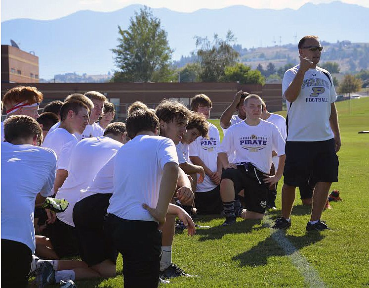 FORMER POLSON football coach Scott Wilson talks to his team during the first fall practice of the football season in 2016. Wilson, who spent 16 seasons as the Pirates&#146; head coach, resigned last week to become the full-time principal at Polson High School. (Jason Blasco/Lake County Leader)