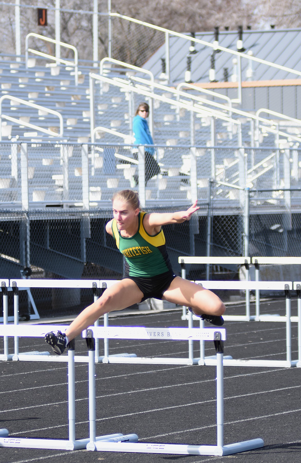 Kate Doorn competes in the 110 hurdles at Legends Field on April 4.