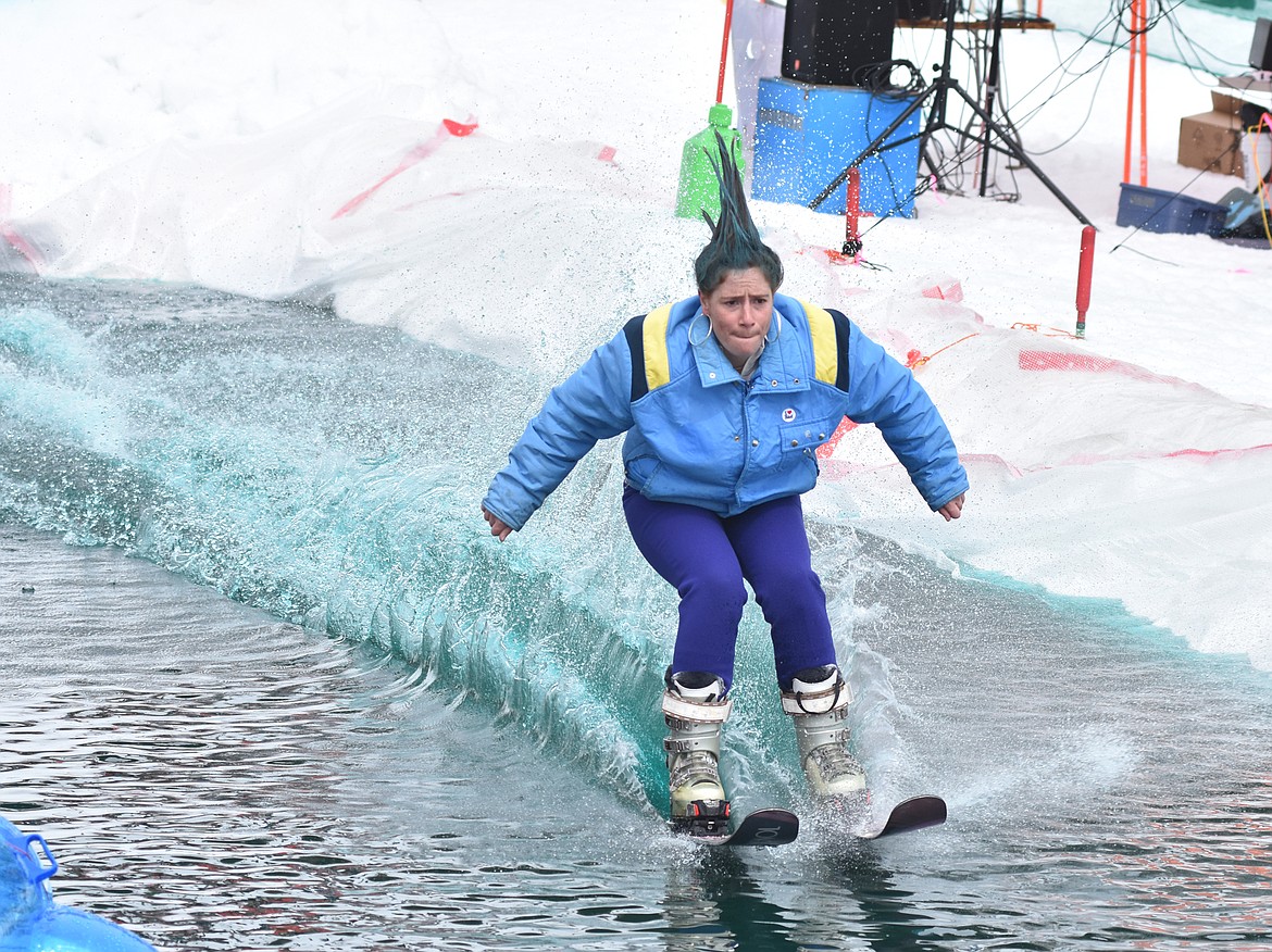 Skiers and snowboarders braved the pond skim competition Saturday at Whitefish Mountain Resort. The annual event marks the end of ski season. (Heidi Desch/Whitefish Pilot)