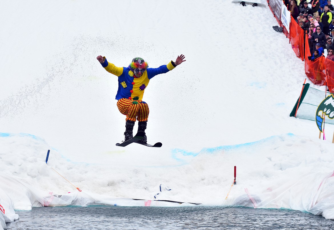 Skiers and snowboarders braved the pond skim competition Saturday at Whitefish Mountain Resort. The annual event marks the end of ski season. (Heidi Desch/Whitefish Pilot)