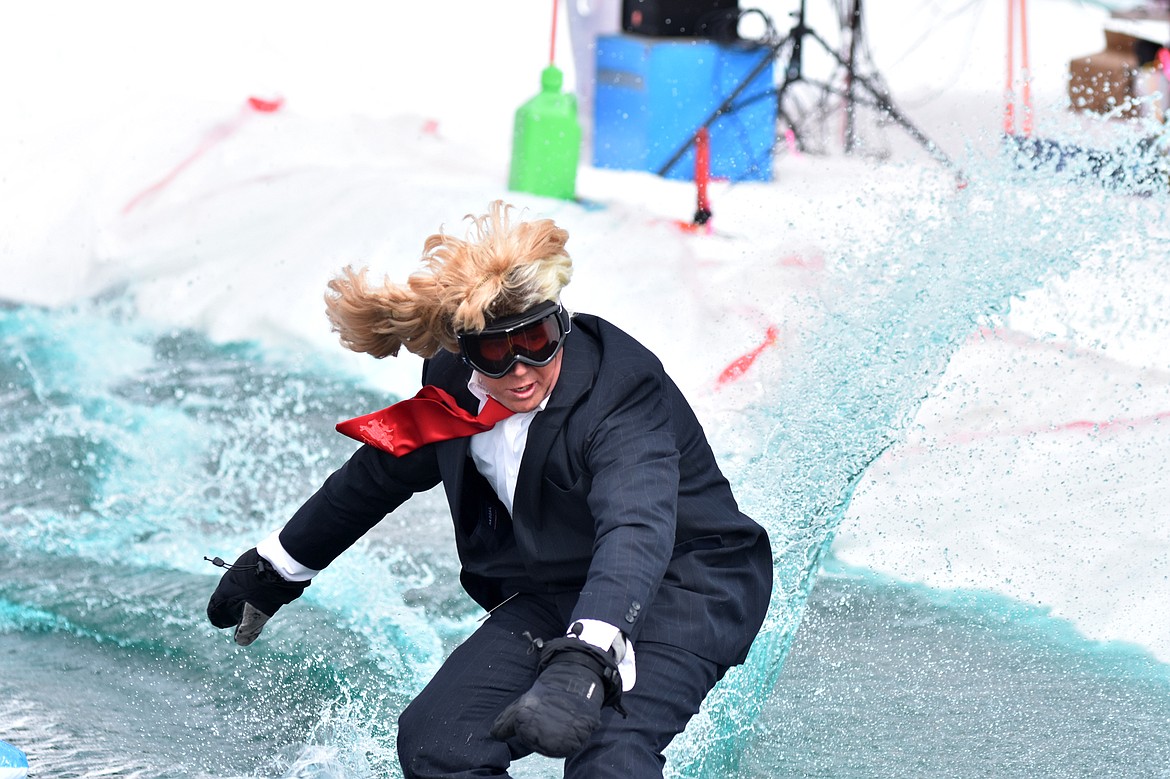 Skiers and snowboarders braved the pond skim competition Saturday at Whitefish Mountain Resort. The annual event marks the end of ski season. (Heidi Desch/Whitefish Pilot)