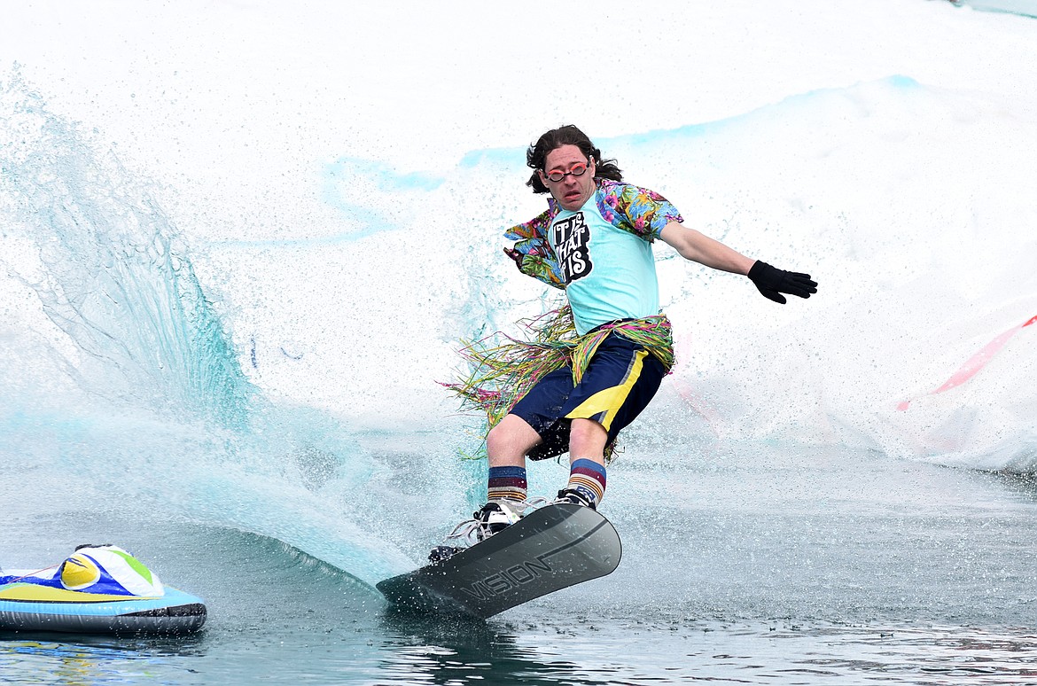 Skiers and snowboarders braved the pond skim competition Saturday at Whitefish Mountain Resort. The annual event marks the end of ski season. (Heidi Desch/Whitefish Pilot)