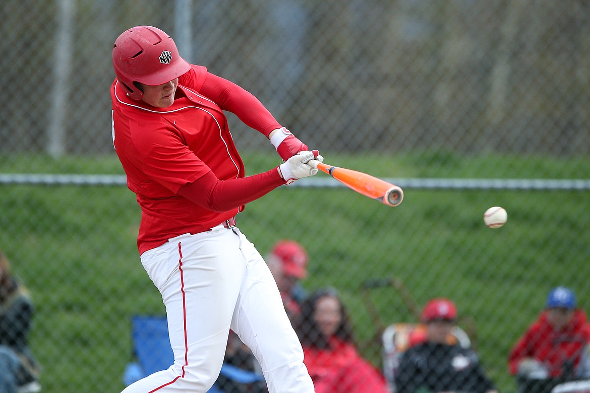 JASON DUCHOW/JasonDuchowPhotography.com
Tres Hiatt of Sandpoint singles against Lakeland on Saturday.