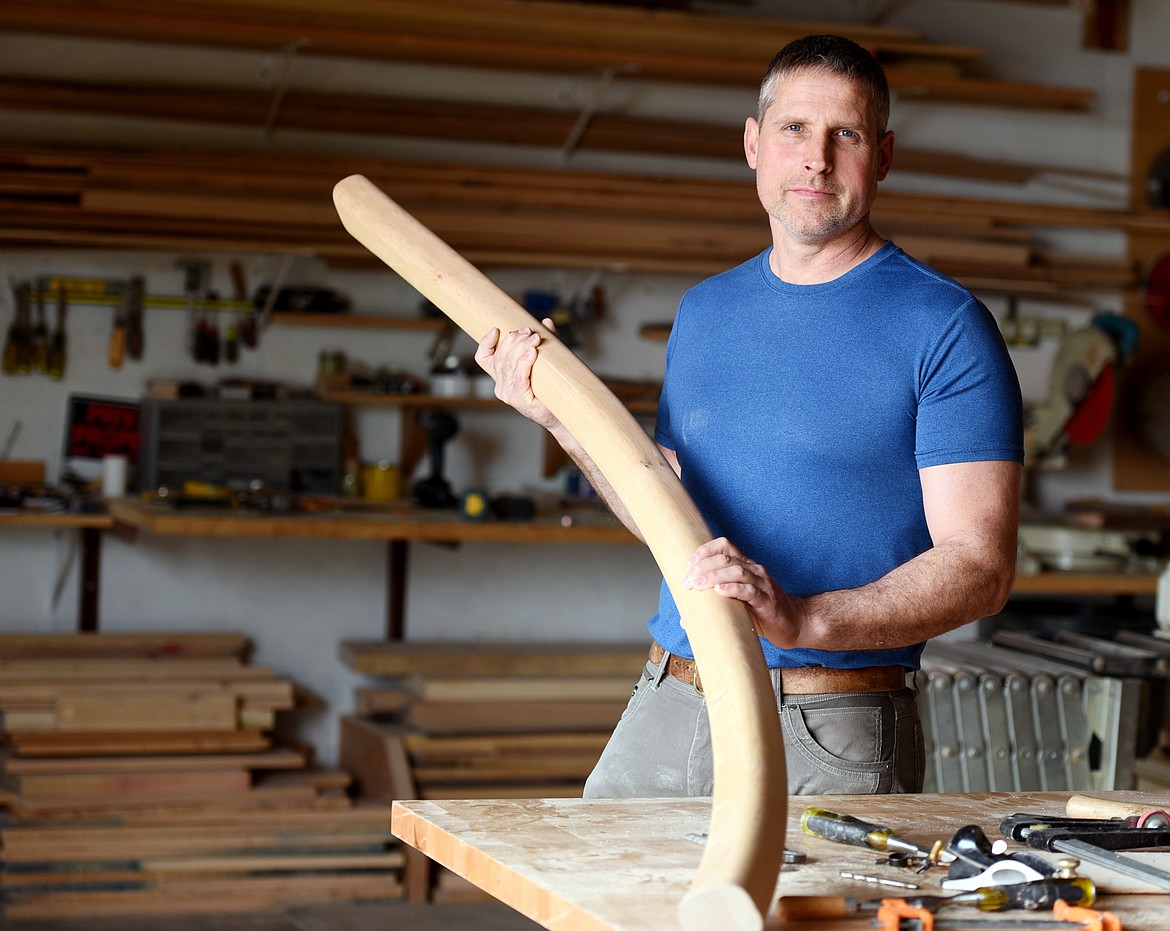 Zane Smith in his shop in West Valley on April 24. Smith was subcontracted by Northwest Cabinet Works for his expertise in the spiral staircase construction and is also doing in-field assembly work. (Brenda Ahearn/Daily Inter Lake)