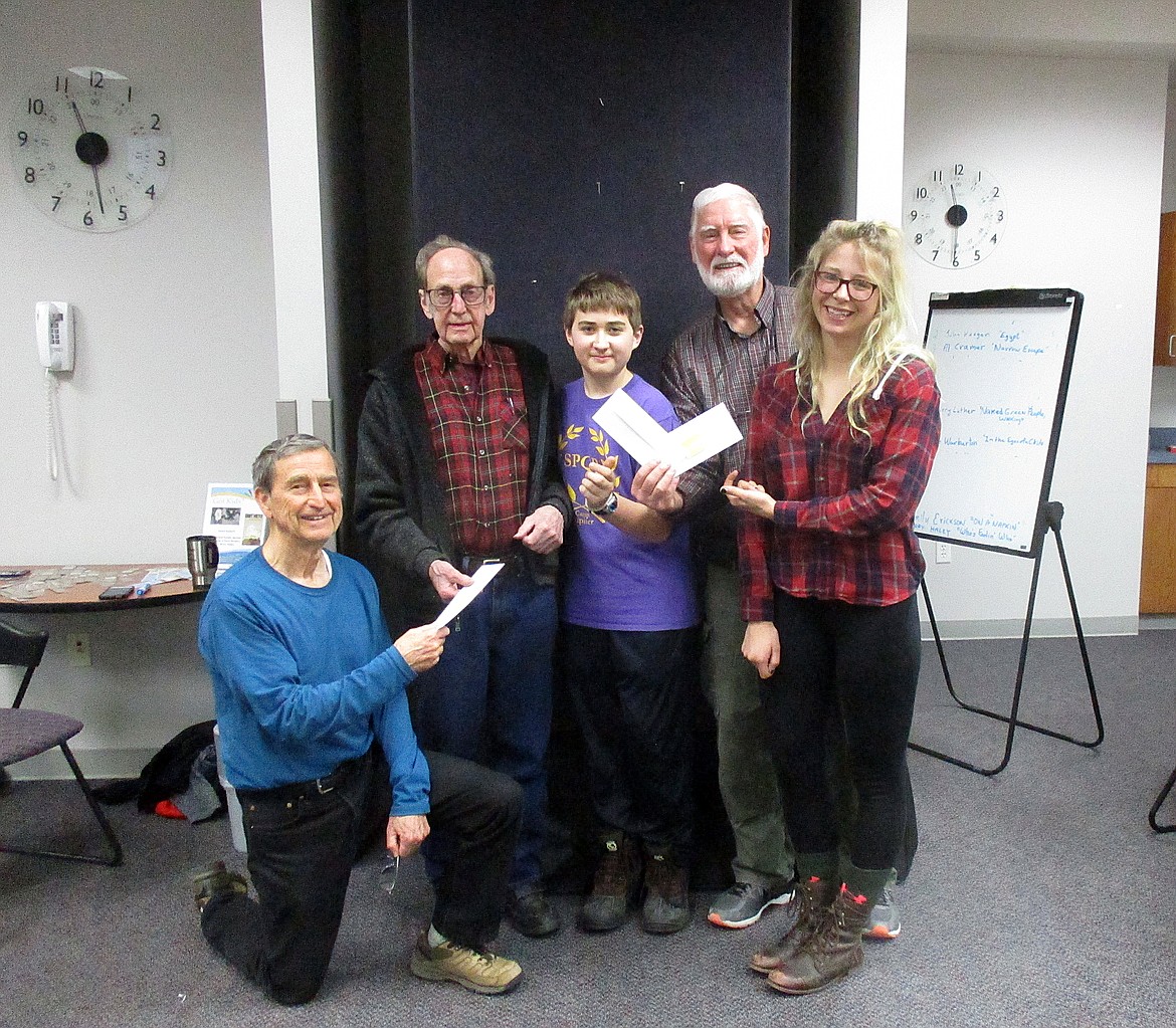 (Photo courtesy BILL COLLIER)
Winners of the Sandpoint Chapter of the Idaho Writers League&#146;s annual open-to-the-public writing contest pose for a photo at the East Bonner County Library recently. Pictured, from left, are past president Jim Payne, Al Cramer, second-place winner, &#147;Narrow Escape&#148; $25; John Keegan, third-place, poem &#147;Egypt&#148;, $15; president Bill Collier; and Emily Erickson, first-place, &#147;On a Napkin&#148;, $50 gift certificate to Vanderford&#146;s Book Store. Idaho Writers League meetings are held held every first and third Saturday at 9 a.m. at the library.