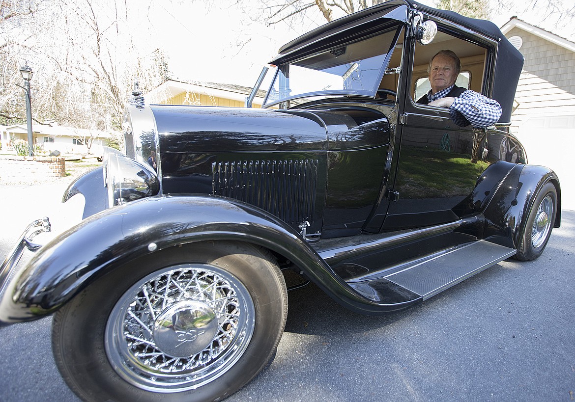 LISA JAMES/Press
Pat Acuff poses with his 1929 Model A Ford at his Fernan Lake home.