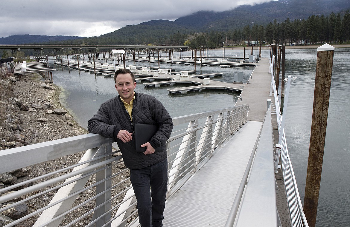 LISA JAMES/Press
Hayden Anderl poses at the River's Edge Marina, which he has purchased with his father Tom Anderl and John Magnuson. The 142-slip marina has been closed the past four years. It will be in operation this summer.