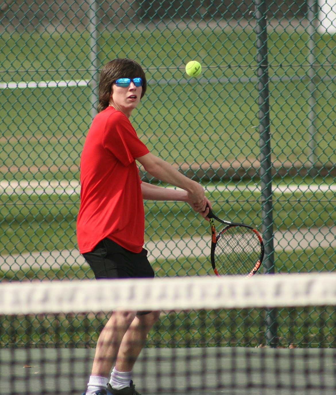 (Photo by ERIC PLUMMER)
Shane Curtis scored a win at No. 2 boys singles with consistency and deep ground strokes.