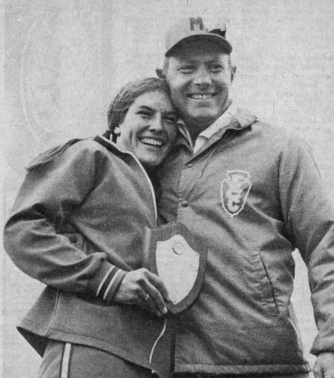 TOP INDIVIDUAL finisher Carla Heintz hugs her coach, Neil Eliason, at the 1977 NJCAA national championships in Dodge City, Kansas. (Photo courtesy of Neil Eliason)