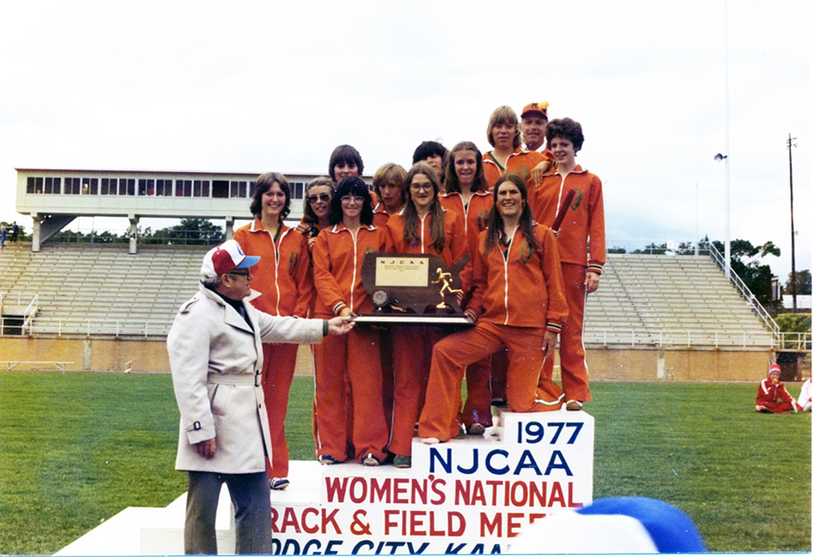 THE 1977 Flathead Valley Community College Mountainettes collect their trophy after winning the National Junior College Athletic Association&#146;s national championship. (Photo courtesy of Neil Eliason)