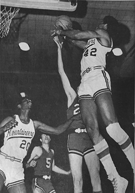 FVCC&#146;s MIKE Vernon (42) rips the ball out of the hands of a Whitworth Pirate. Vernon was backed up by Dexter Holloway, who scored 20 points in the season finale, which proved to be the last men&#146;s basketball game at the college. (Courtesy Dave Cassan)