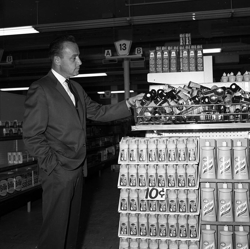 Jack Brown, manager and founder of the B&amp;B shopping Center, looks over some of the inventory in this 1966 photo from the Daily Inter Lake that was taken to note one of the store&#146;s expansions. (Inter Lake file photo)