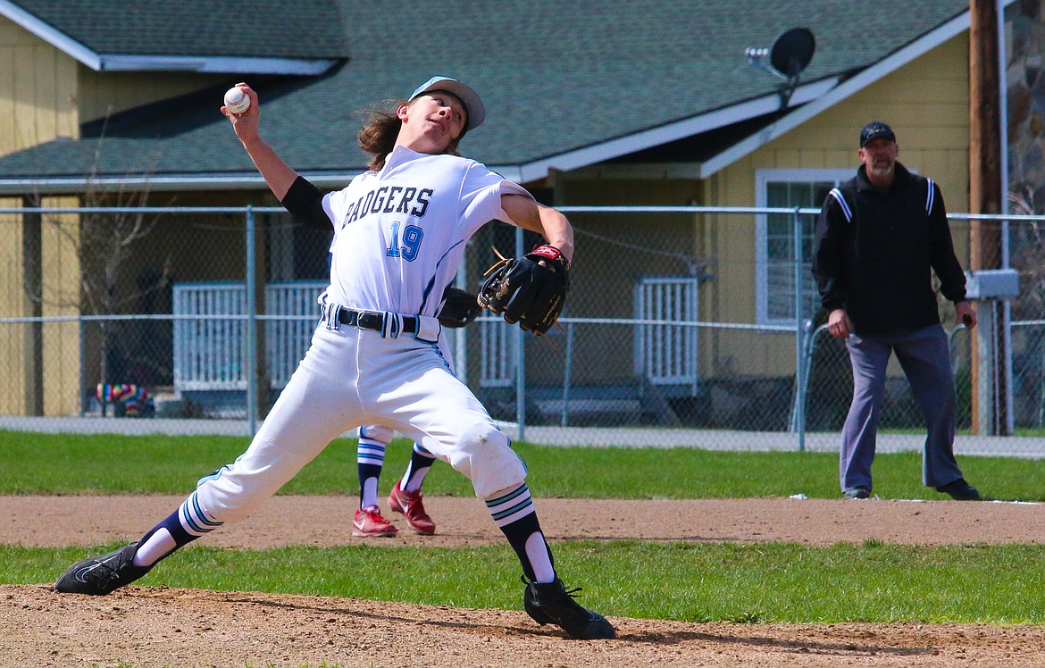 &#151; Photo by MANDI BATEMANSenior Jesse Dunham pitching during a home game.