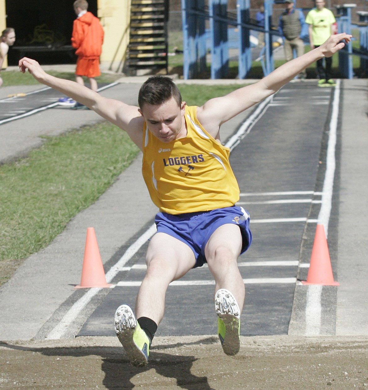 Freshman Tyler Serna competes in the long jump, Libby Invite April 22. (Paul Sievers/TWN)