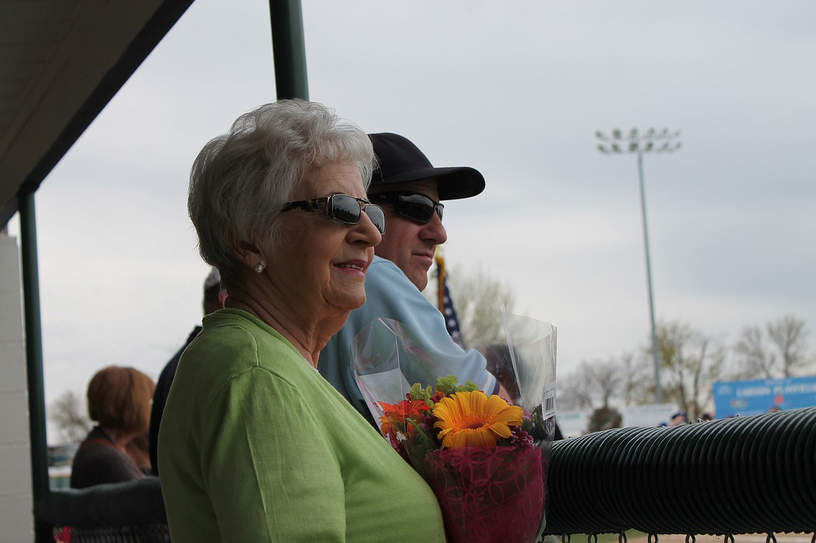 Charles H. Featherstone/Columbia Basin Herald
Grand Marshal Mike Rhoades and his wife Nancy watch the opening ceremonies on Saturday as Little League formally begins in Moses Lake.