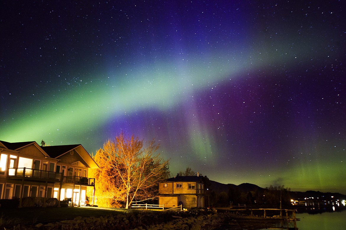 THE AURORA borealis lights up the sky over Bear Harbor on Rocky Point Road Friday evening. The lights were visible to the north throughout the night. (Jeremy Weber/Lake County Leader)