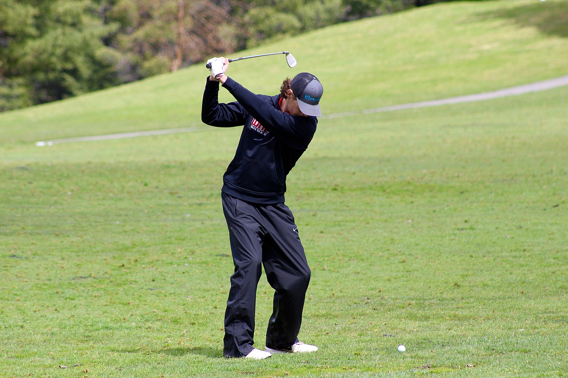 Wallace golf photos by Chanse Watson 
Wallace golfer Erik Brackebusch mid-swing during Friday&#146;s golf match at Shoshone Golf Course in Big Creek. Brackebusch took second place overall at the event with a score of 86, just two strokes behind the first place finisher.