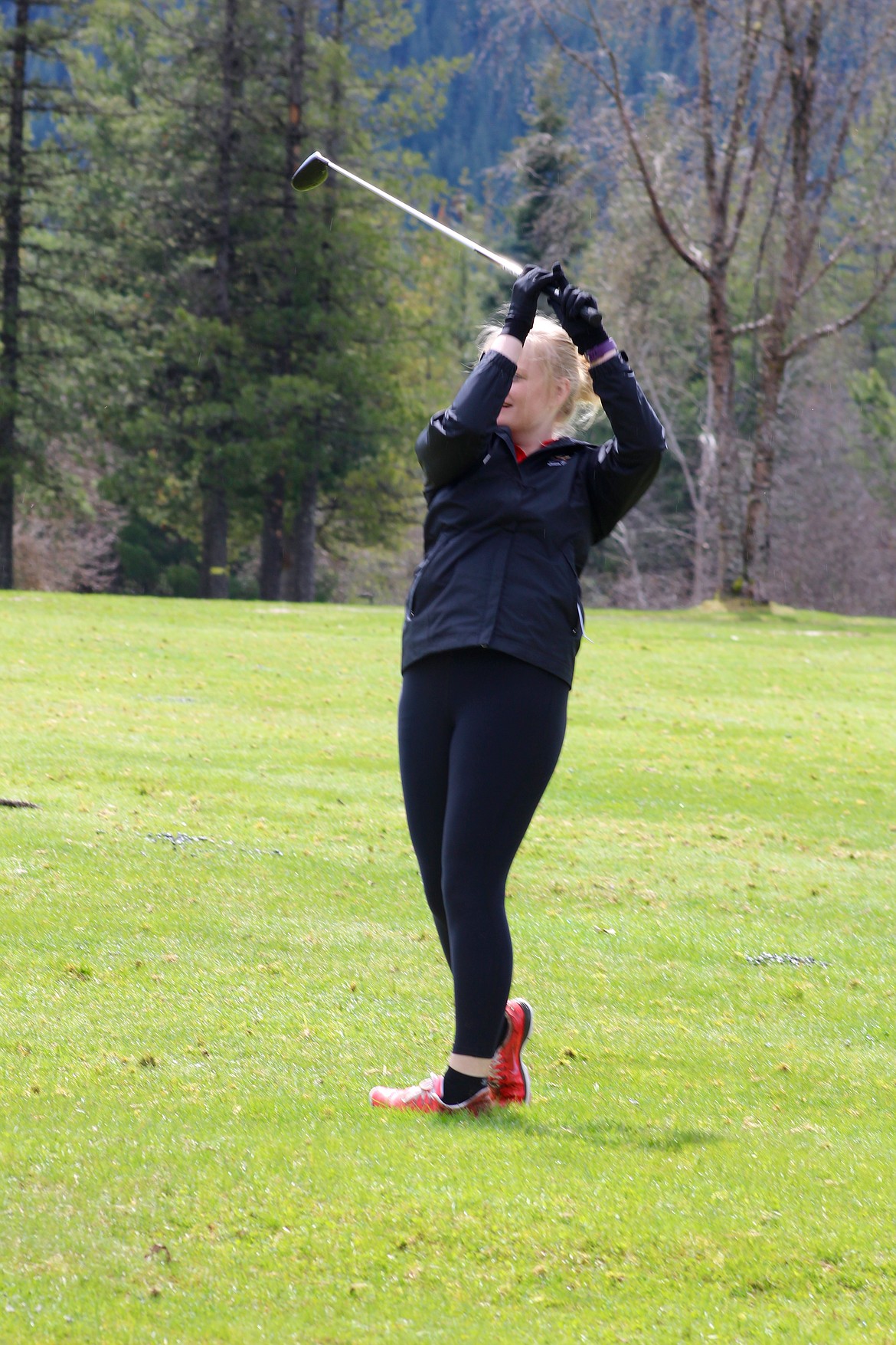 Wallace golfer Kayla Bayer follows through at Friday&#146;s match.
Bayer was the top finisher for the Miners with a score of 114.